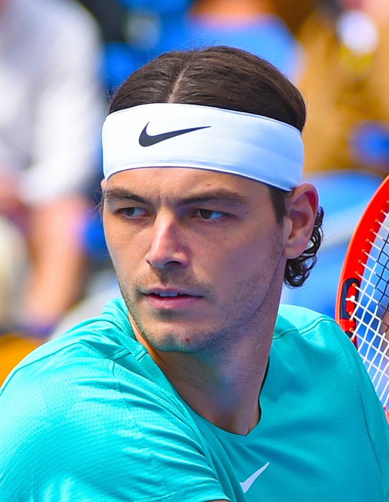 Taylor Fritz hitting a tennis shot